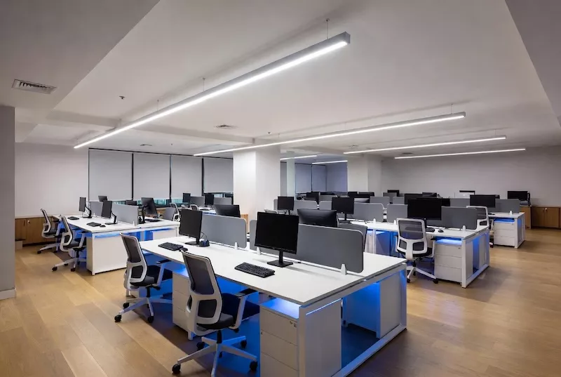 Boost productivity in modern offices with energy-efficient LED strip lights under desks, in ceiling coves, and behind cabinets for clean task and accent illumination